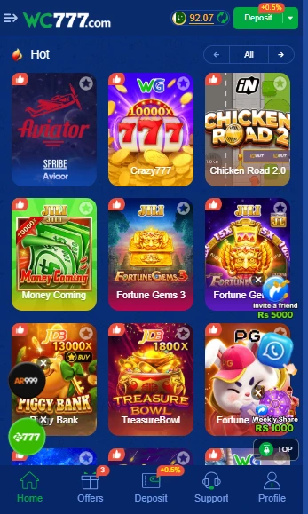 WC777 Game main menu showing casino games, wallet, bonuses, and earning options